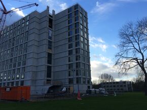 The new-build residential tower with the spaceboxes in the back.