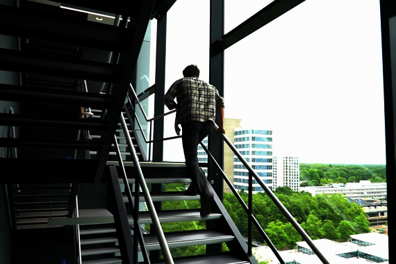 Students climb the stairs of Atlas for the Eindhoven Championship in Stair Climbing