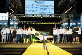 Proud team with their car. Photo | Bart van Overbeeke