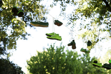 Green sneakers over limbopad.