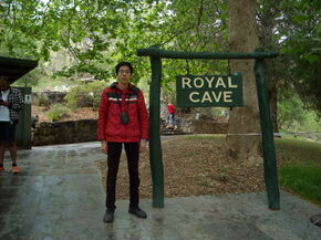 Victor at the entrance of the Royal Cave. Photo | Private archives | Victor Lam