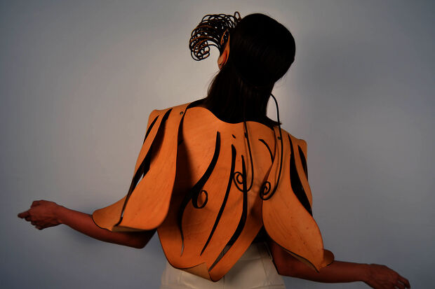 Industrial design student showing sustainable leather tanning in Milan
