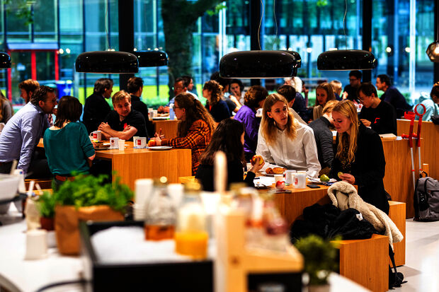Discussing well-being over a croissant and a bowl of yoghurt