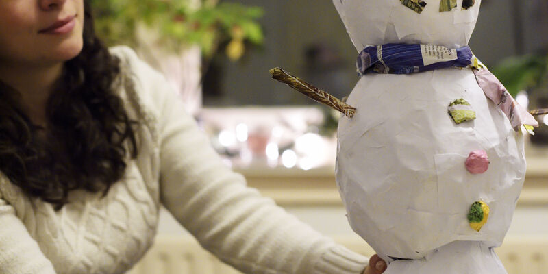 Maria Frias with her home made snowman  piñata. Photo | Bart van Overbeeke