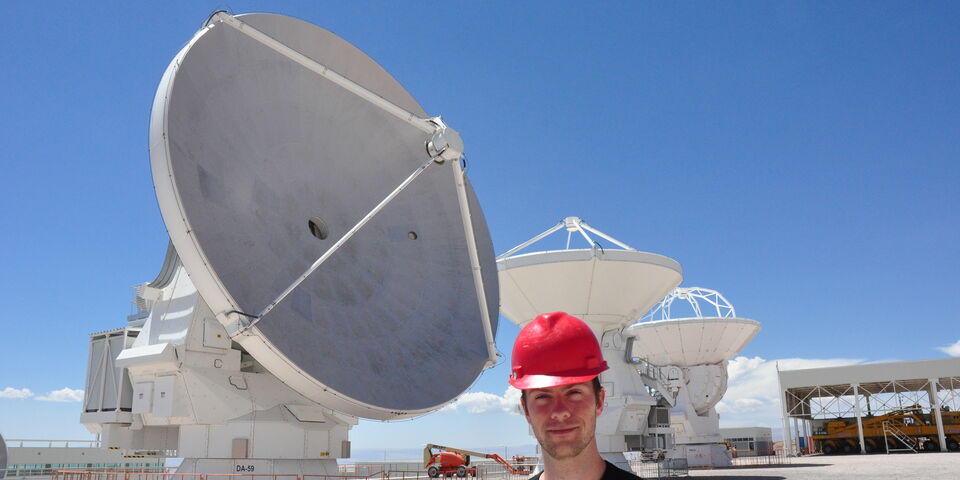 Rick with a mere three of the 66 antennas that make up the ALMA observatory.