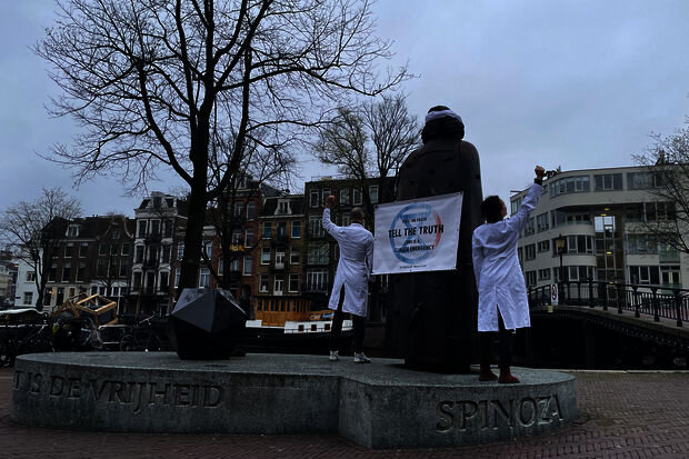 Scientist Rebellion blindfolds statues