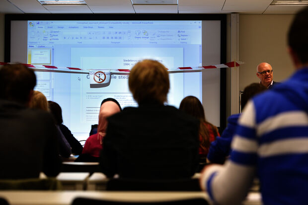 Playful campaign low-hanging boards in lecture theaters