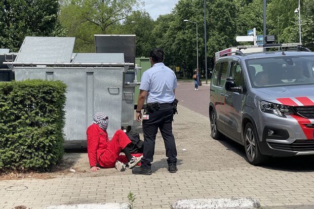 Activists deface Atlas with red paint