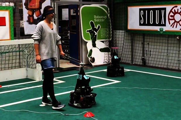 Football robot turns into guide dog for the blind