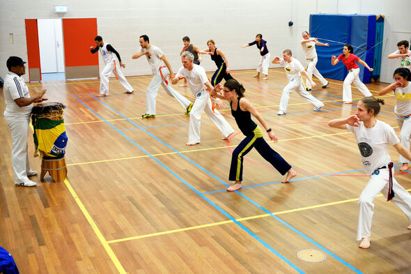 Een capoeira-les. Foto | Bart van Overbeeke