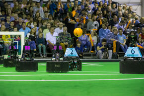 De voetbalrobots in actie. Foto | Nando Harmsen