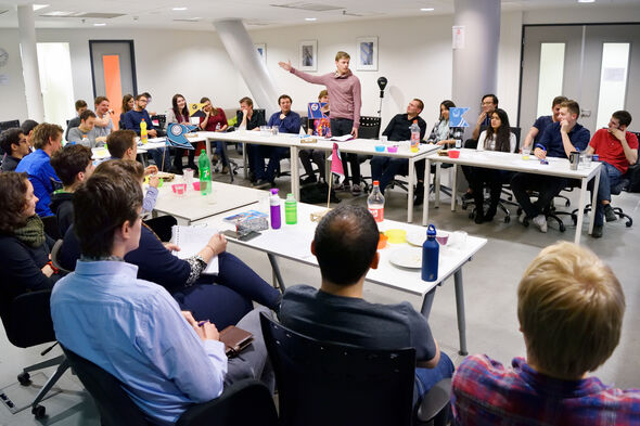 Debate between Honors students and international students' association Cosmos. Photo | Bart van Overbeeke