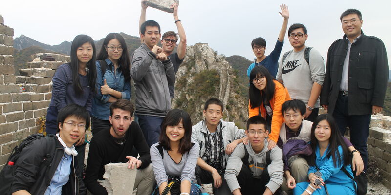 I am the person in the back holding up a brick from the Great Wall. Don’t worry, I didn’t break it. There are just a lot of loose bricks on the wall.